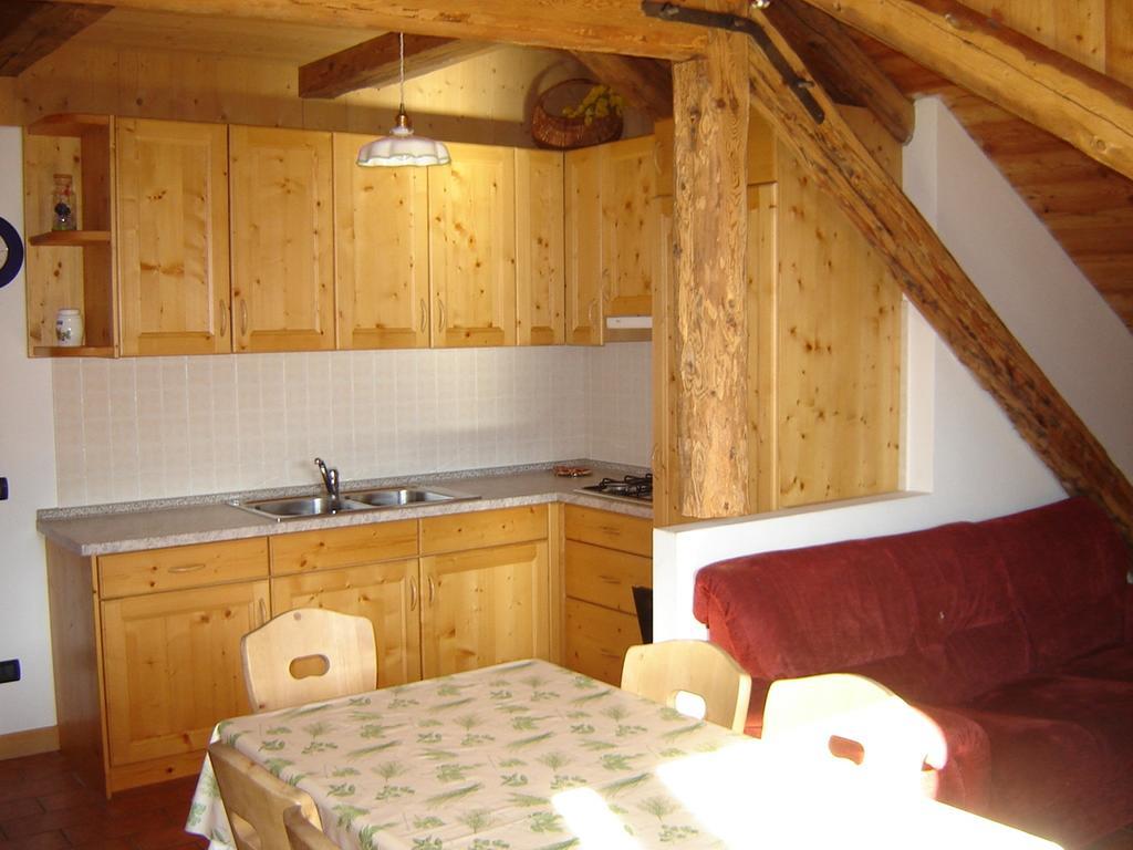 Residenza Domino Aparthotel Selva di Cadore Ruang foto